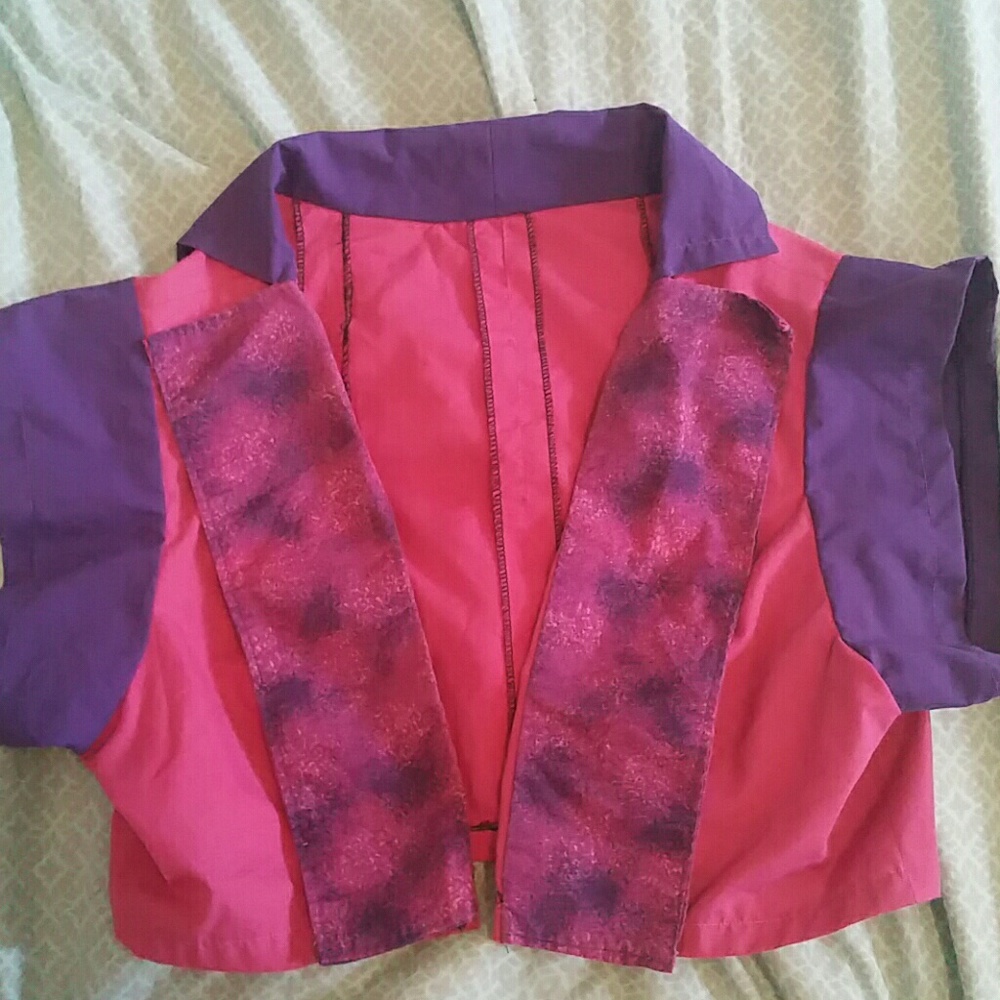 Cute little vest... accessory... thing.